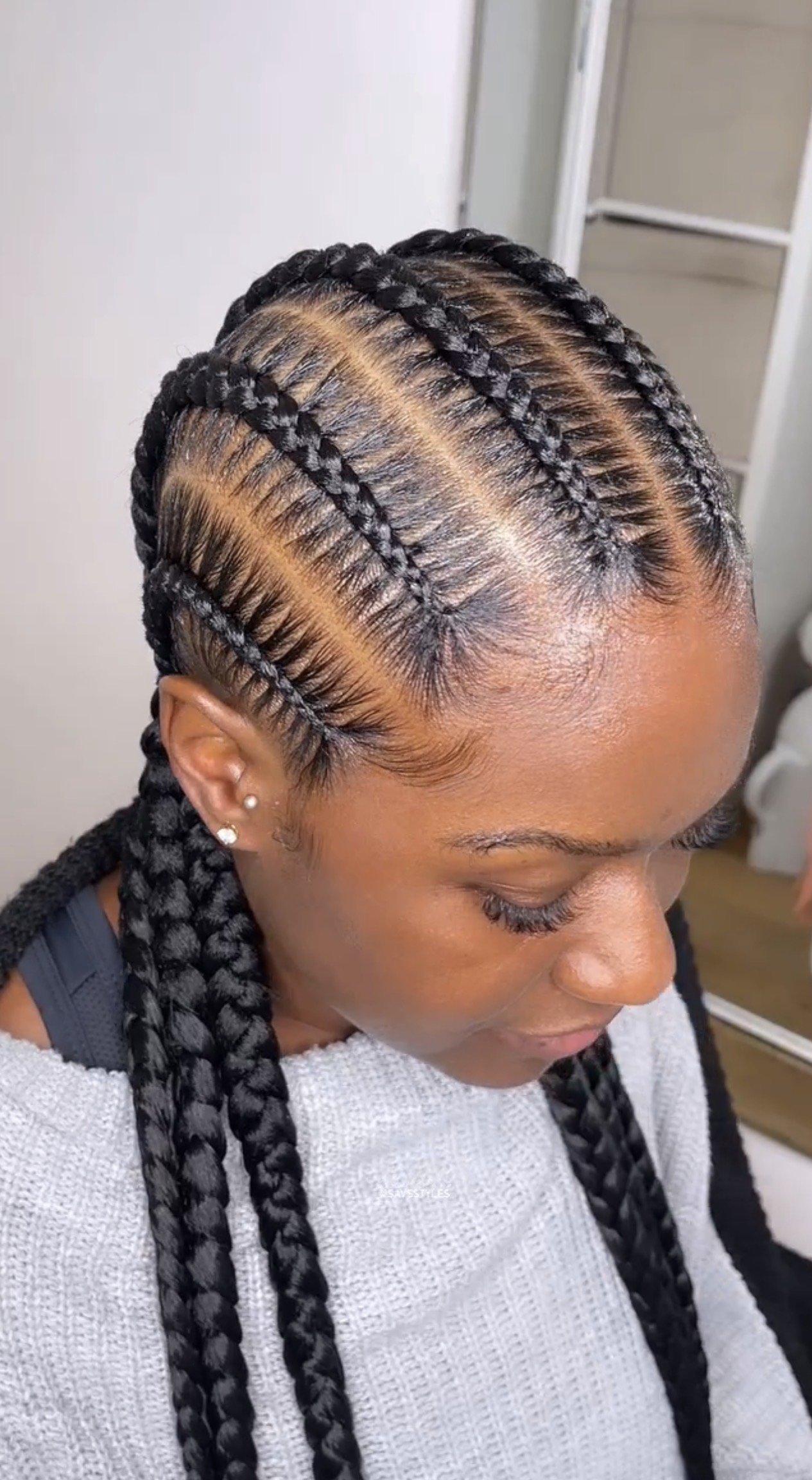 Feed-in braids styled by ShearPerfection Hair Salon