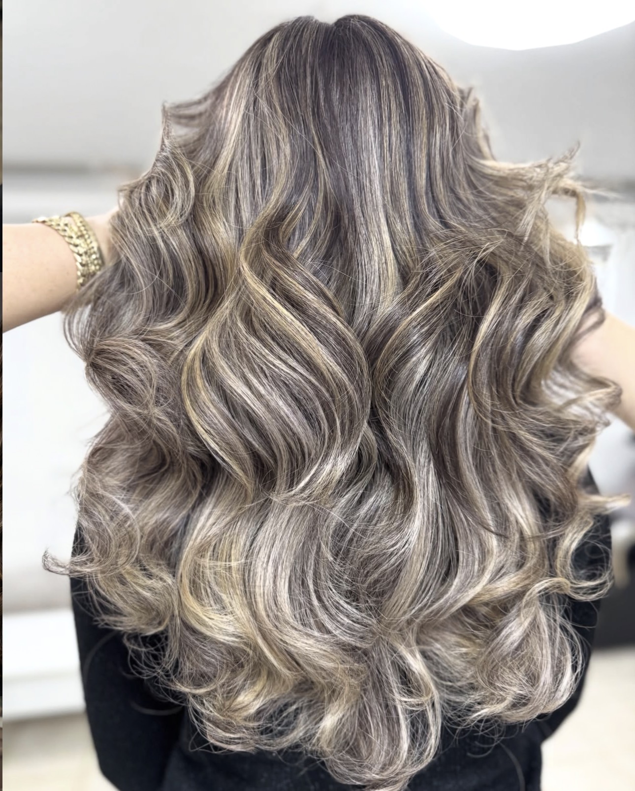 Dimensional highlights styled by ShearPerfection Hair Salon